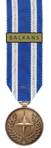 011-6 - NATO Balkans - 16 mm miniature medal